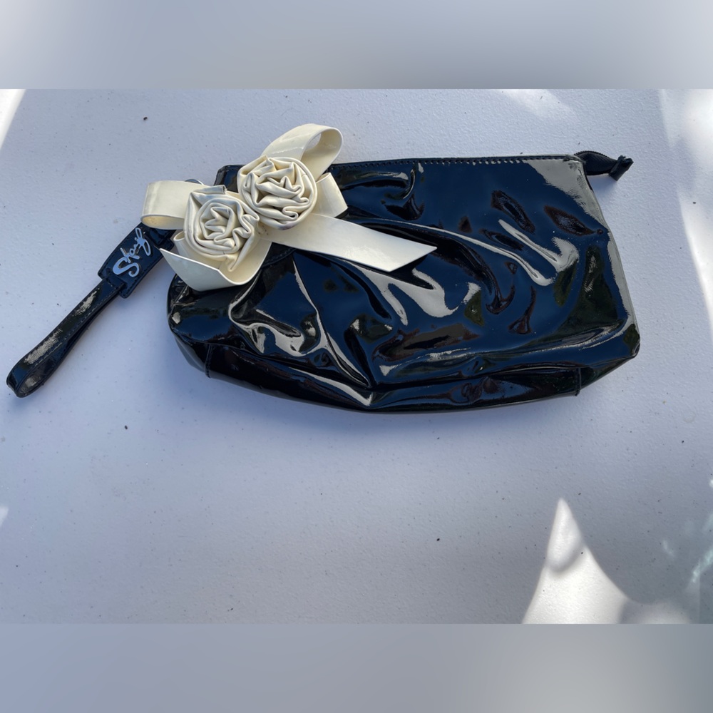Elegant Black Wristlet with Cream Floral Detail